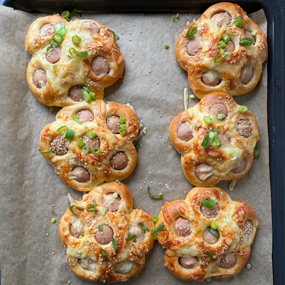 Pølseblomster med ost, sesam og vårløk  - Bilder 6